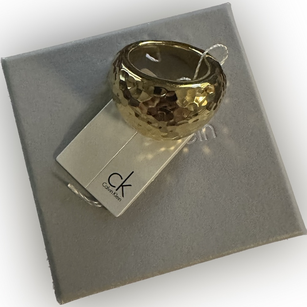 Calvin Klein Gold Ring-Size 8. Cute but one size too big for me. New with tags!